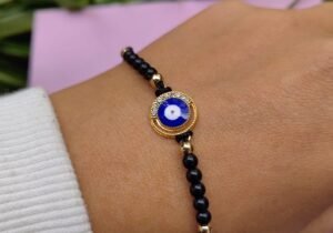 PULSERA NEGRA OJO BRILLO 2